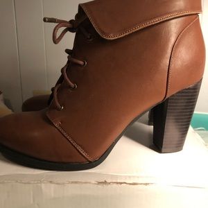 Brown high heeled lace up booties